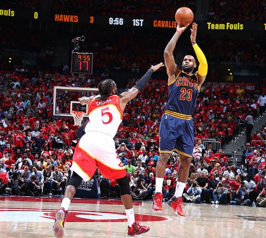 LeBron James #23 of the Cleveland Cavaliers shoots against DeMarre Carroll #5 of the Atlanta Hawks in Game Two of the Eastern Conference Finals Nathaniel S. Butler/NBAE via Getty Images